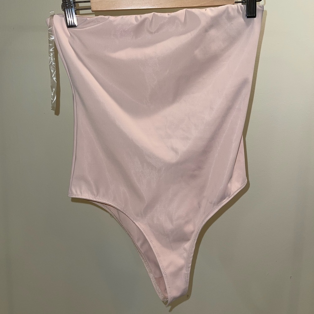 Nude strapless bodysuit. Size small.